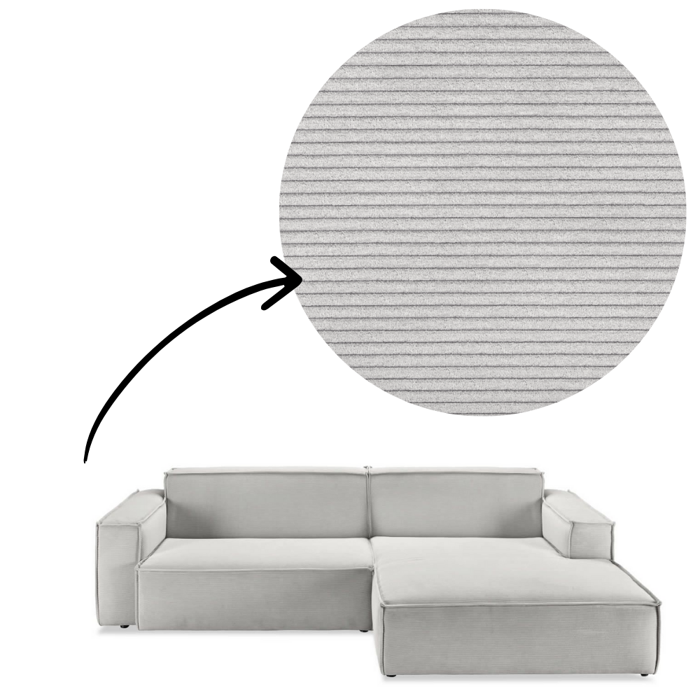 Sofa Midtown - Silver close-up of corduroy fabric texture with arrow indicator, highlighting soft ribbed upholstery for tactile comfort.
